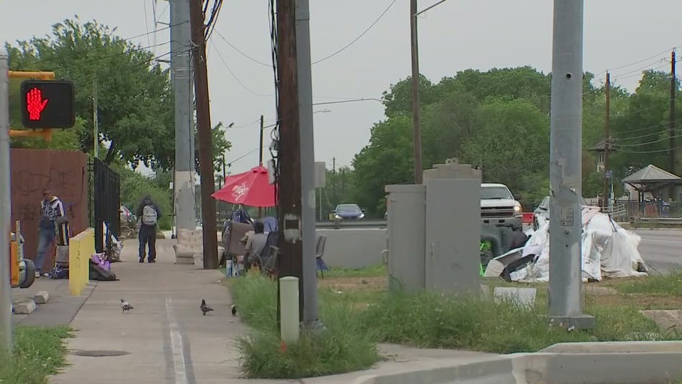 Neighbors say homeless encampment was cleared after machete attack in the area